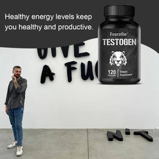 Supplement bottle labeled 'Testogen' with a person standing in front of a wall with graffiti.