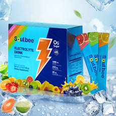 Soulbee electrolyte drink packaging with fruit and ice elements on a light blue background